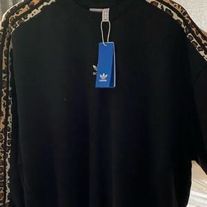 Medium woman’s adidas sweater with cheetah print